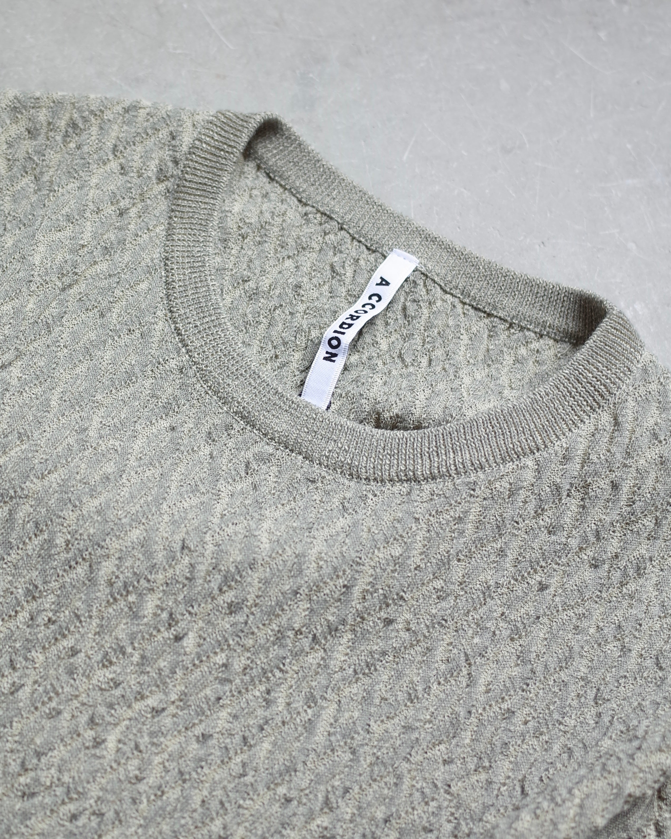 【期間限定】LINKS PATTERN SLEEVE SLIT PULLOVER