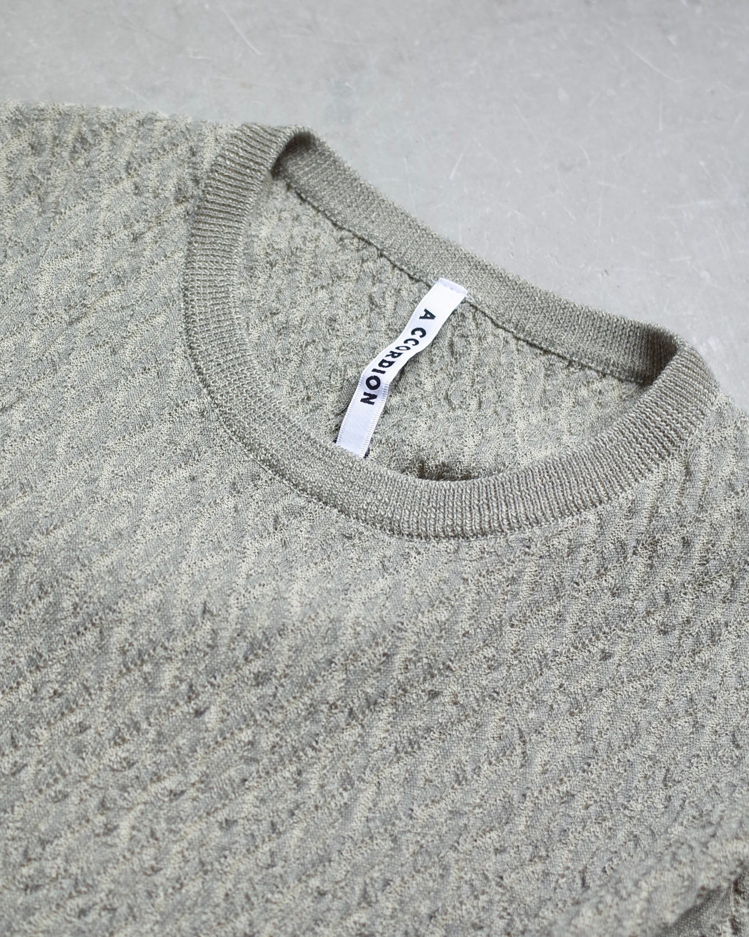 【期間限定】LINKS PATTERN SLEEVE SLIT PULLOVER